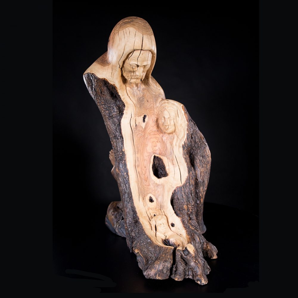 The Protected Olive Wood Holy Family with an Angel